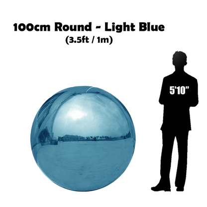 100 cm Big light blue ball beside 5'10 guy silhouette 
