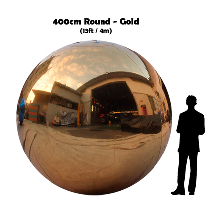 400cm Big gold ball beside 5'10 guy silhouette 